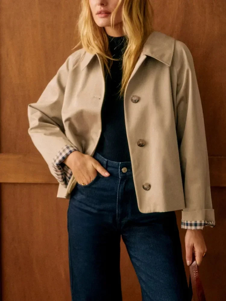 Women's beige cropped jacket with notched collar, buttons and checked cuffs