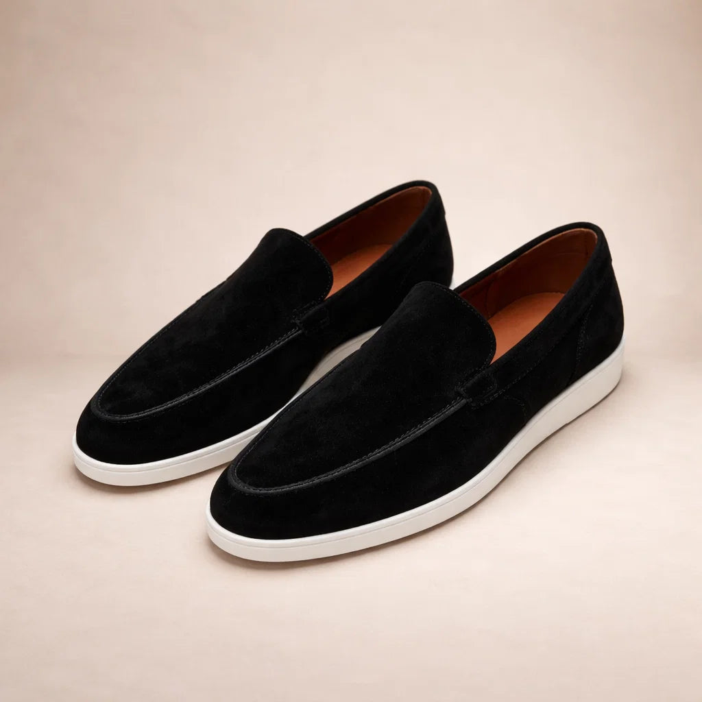 Men's slip-on moc toe loafers with stitched detail and flat light soles