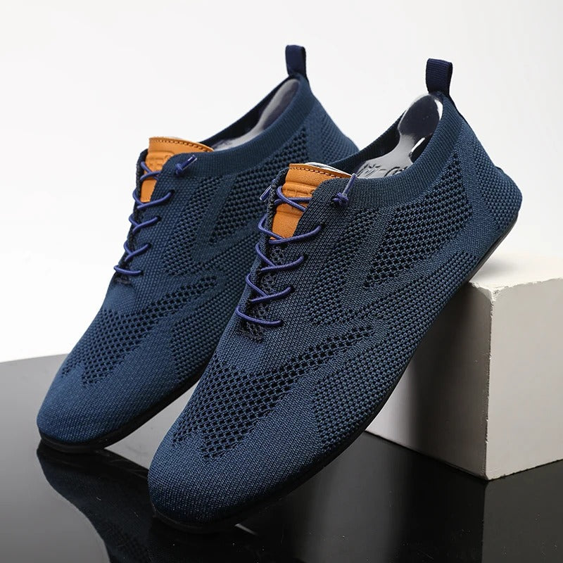 Mesh knit lace-up trainers with textured panels, round toes and flat soles