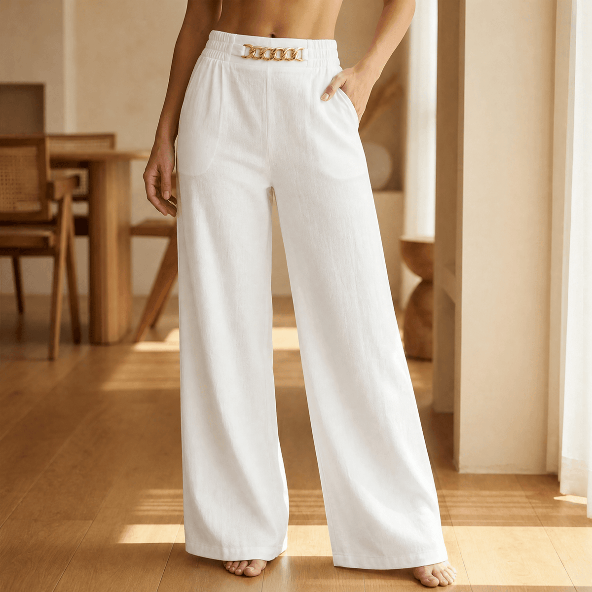 Women's wide leg trousers with high elasticated waist, side pockets and chain detail
