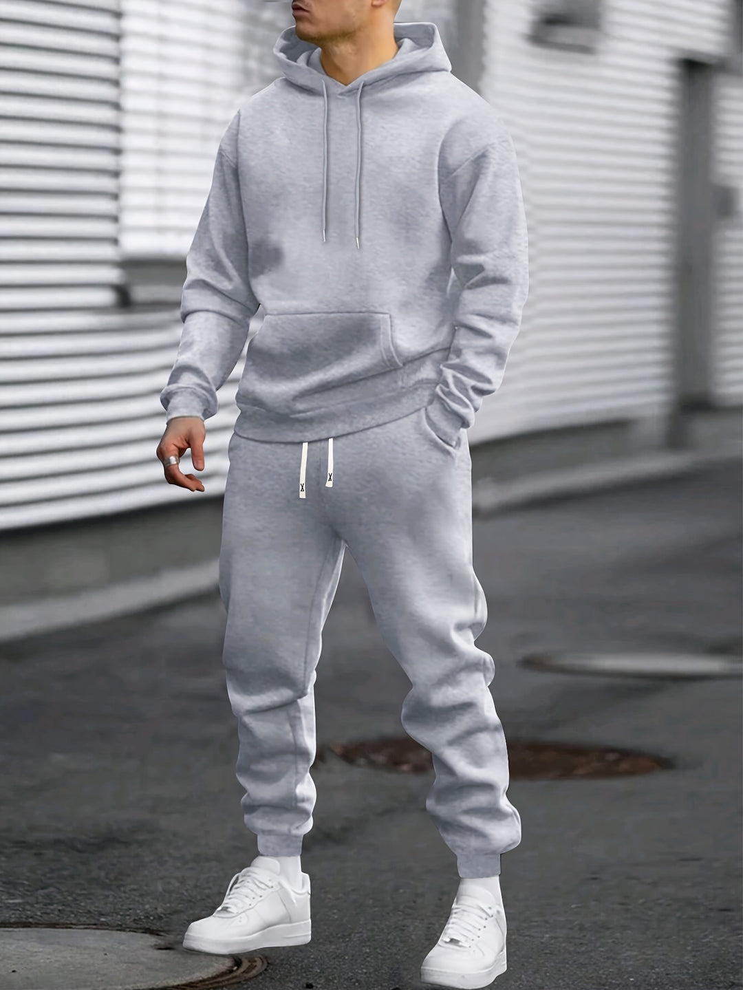 Men's hooded hoodie and jogger trousers set with drawstring details and tapered legs