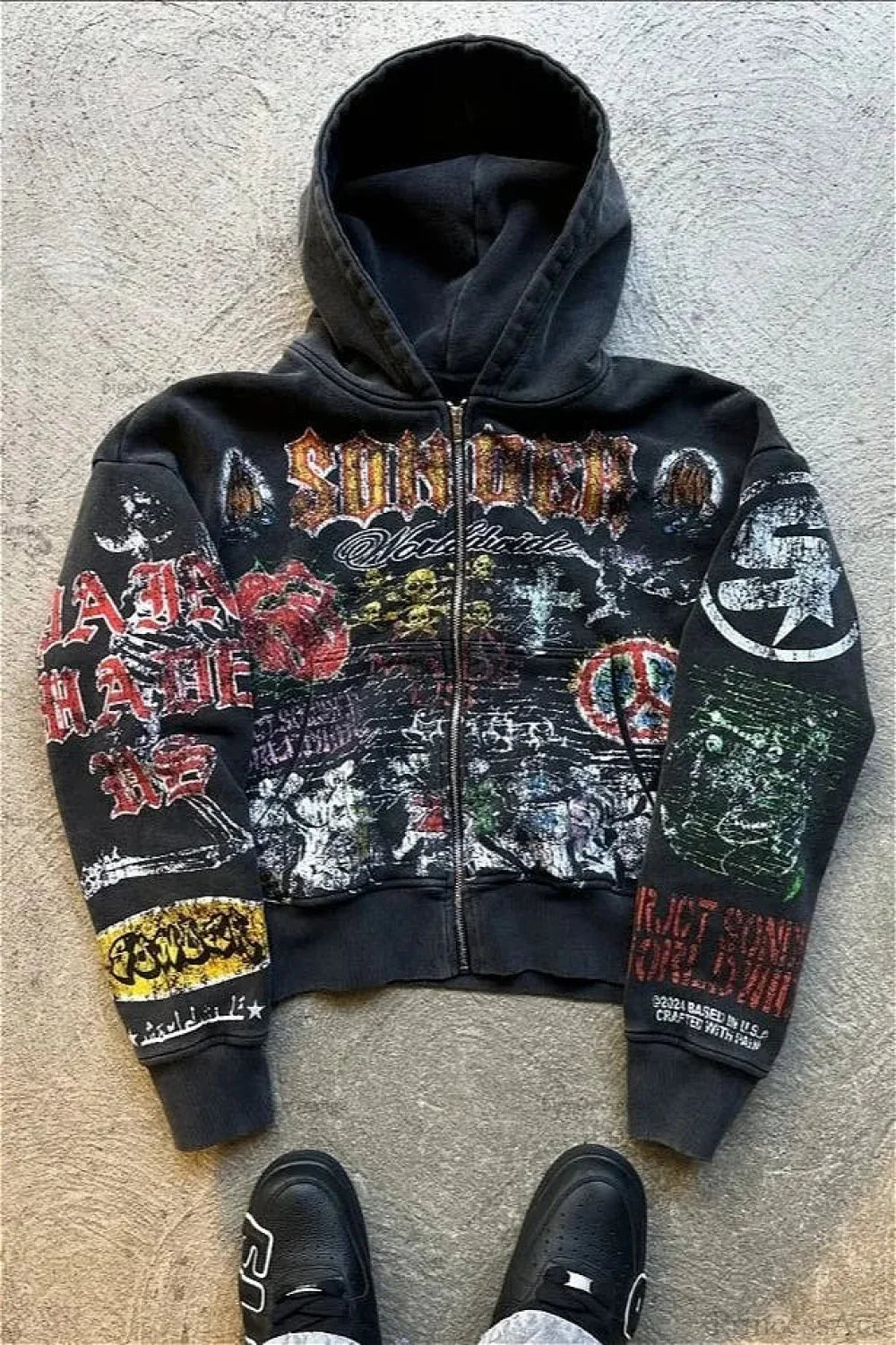 Graphic zip-up hoodie with hood, long sleeves and illustrated lettering panels