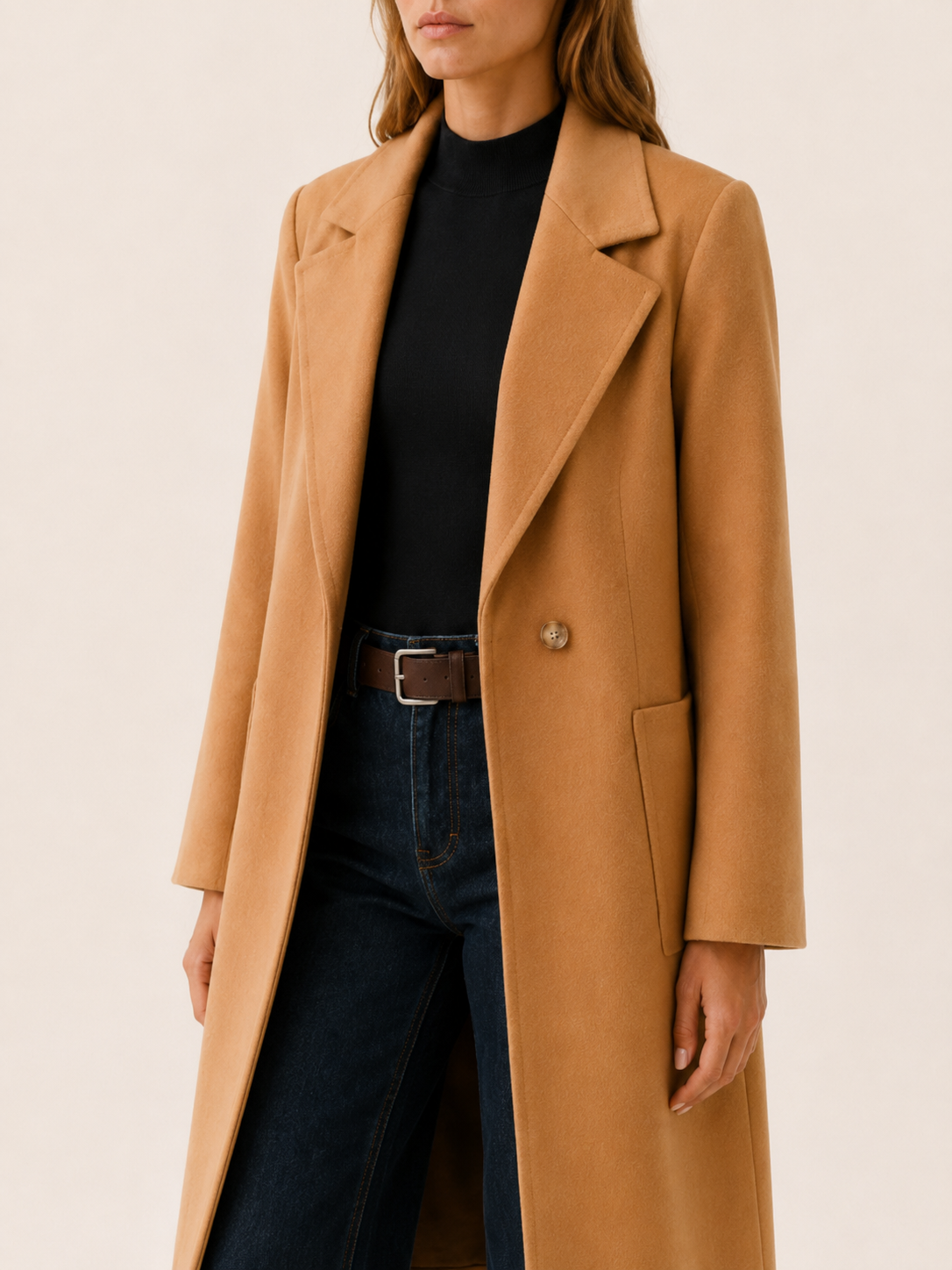 Women's long button-front coat with notched lapels and slanted pockets