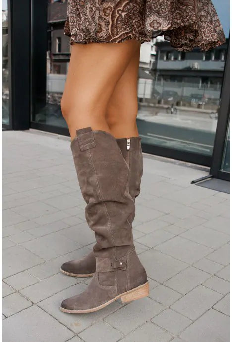 Women's slouch knee-high boots with pointed toes, flat heels and buckle details