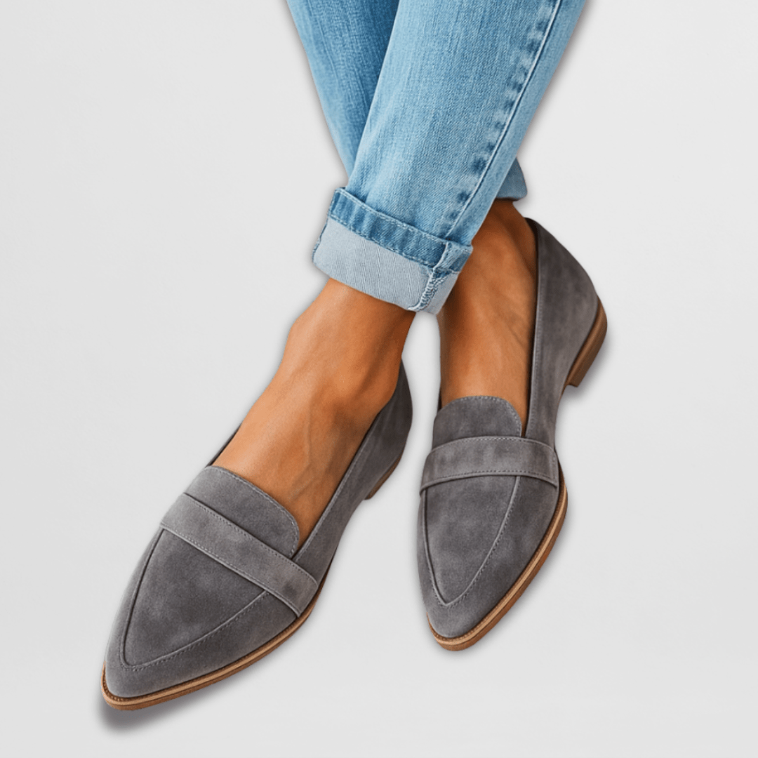 Women's pointed toe penny loafers with textured uppers and low heels