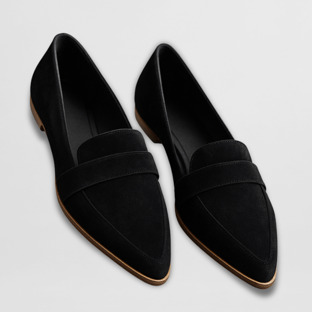 Women's pointed toe penny loafers with textured uppers and low heels