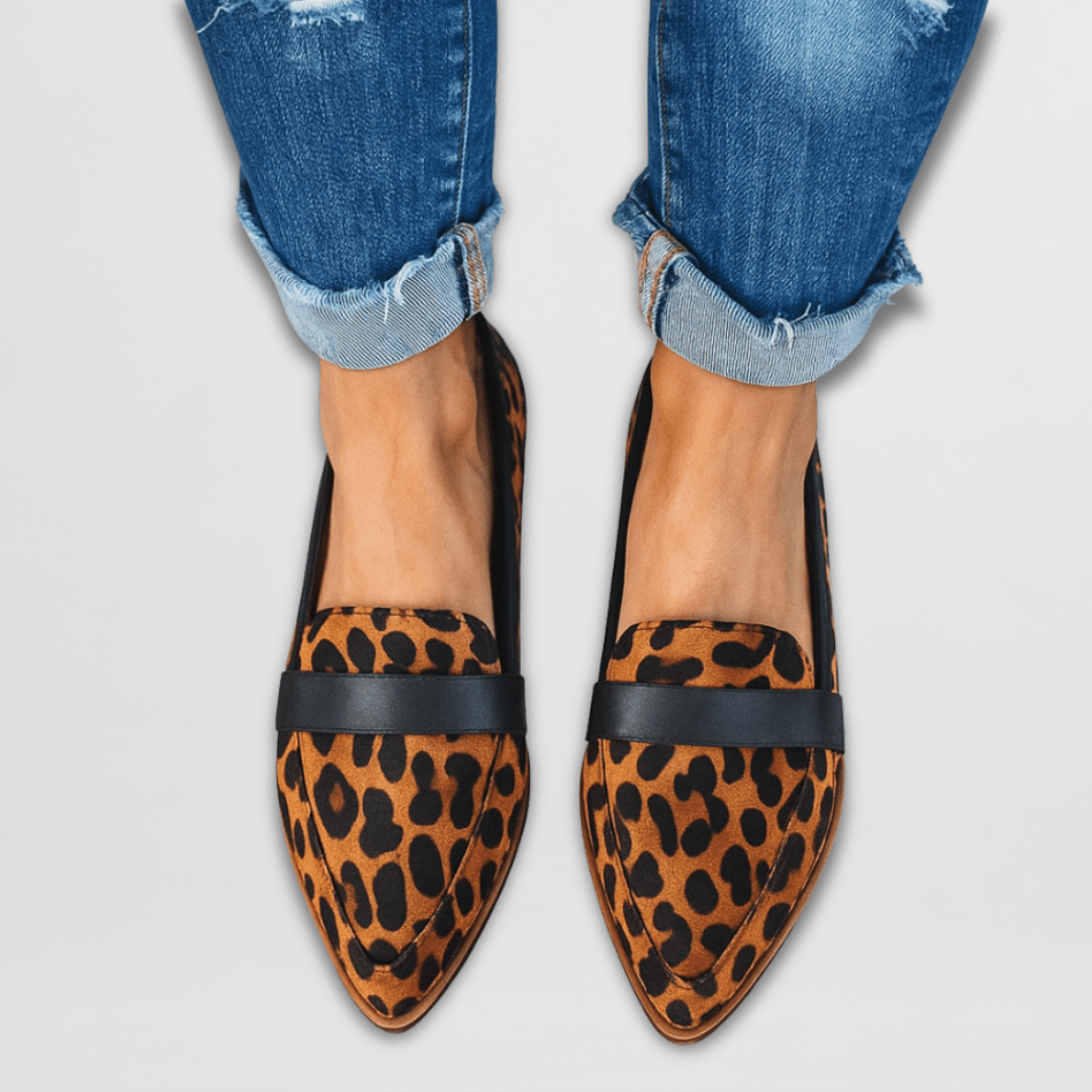 Women's pointed toe penny loafers with textured uppers and low heels