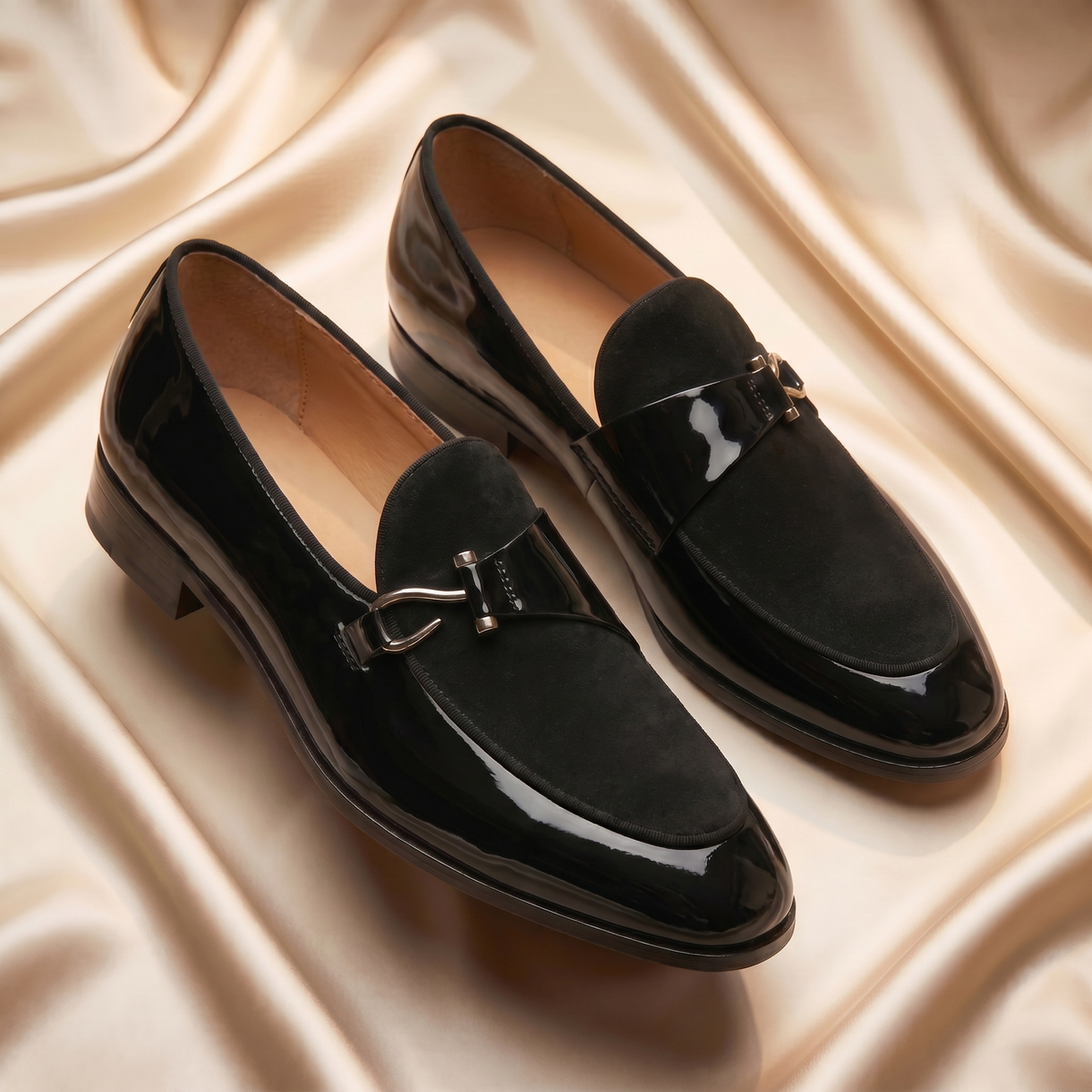 Men's slip-on loafers with almond toe, glossy finish and buckle trim
