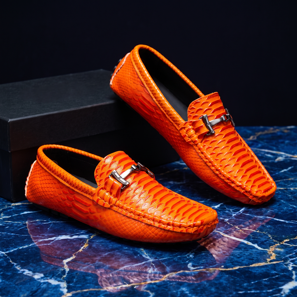 Textured loafers with front buckle detail and flat soles