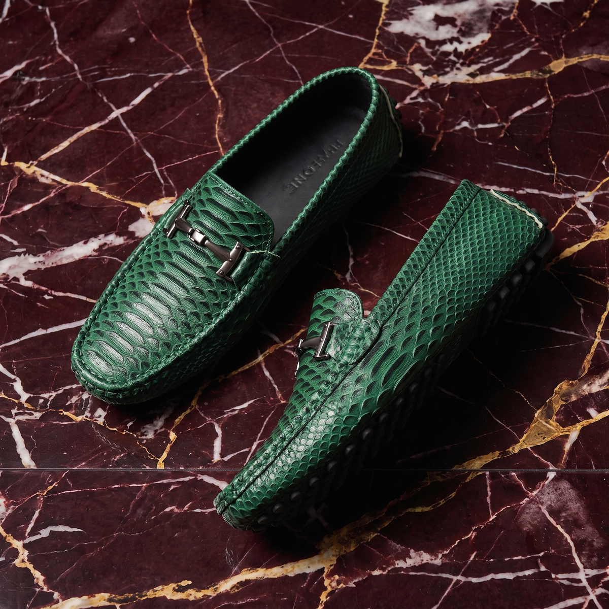 Textured loafers with front buckle detail and flat soles