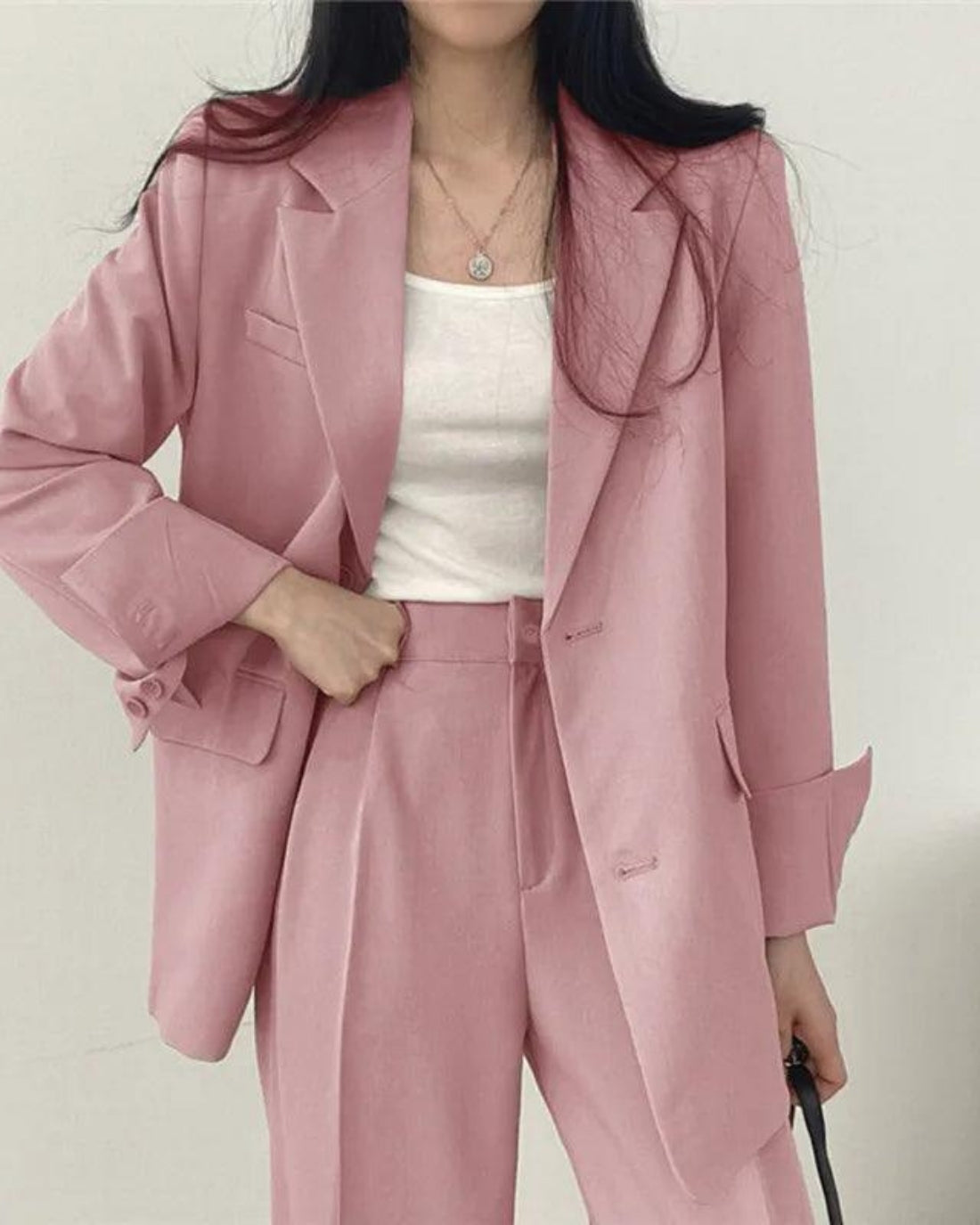 Women's oversized trouser suit set with long blazer and wide-leg trousers