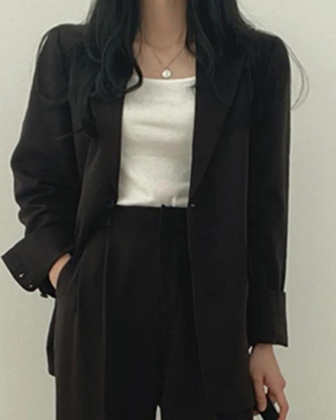 Women's oversized trouser suit set with long blazer and wide-leg trousers