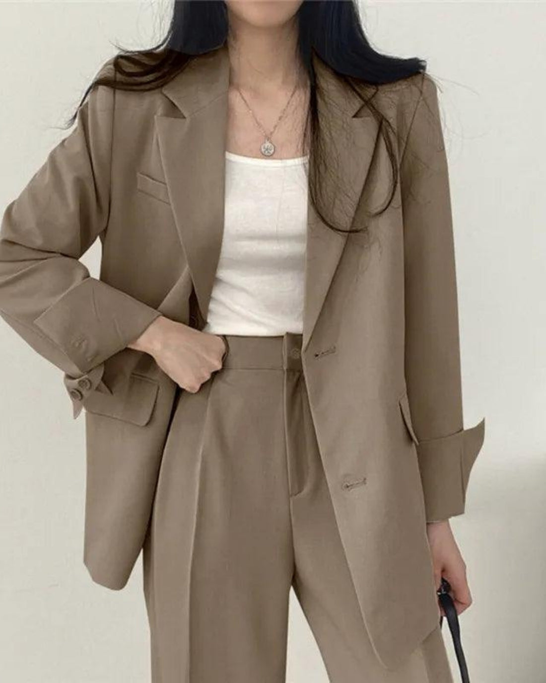 Women's oversized trouser suit set with long blazer and wide-leg trousers