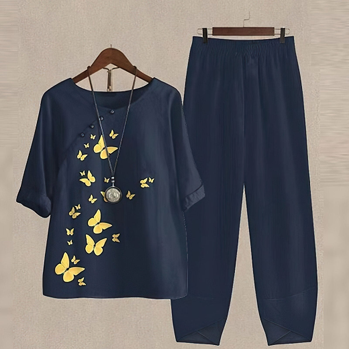 Women's two-piece set with short-sleeved patterned top and long trousers