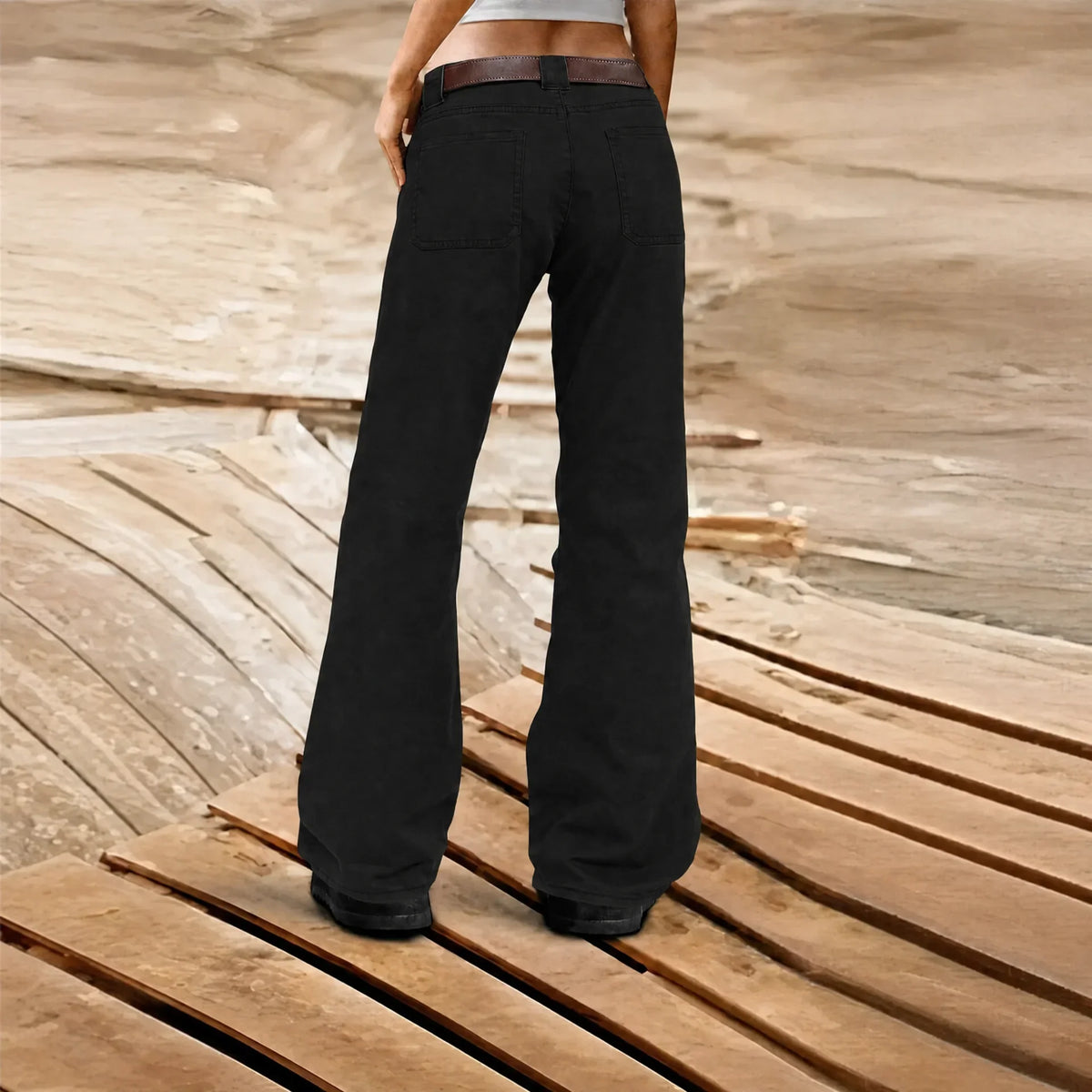 Women's wide-leg cargo trousers with utility pockets and belt loops