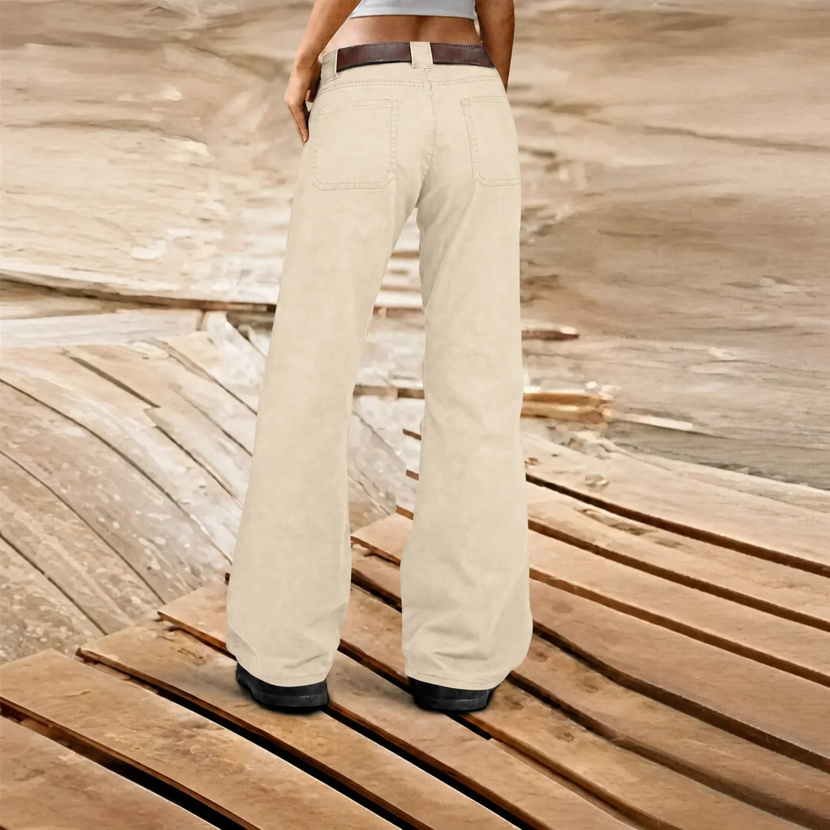Women's wide-leg cargo trousers with utility pockets and belt loops