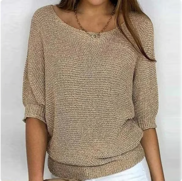 Women's relaxed plain knit sweater with round neckline and three-quarter sleeves