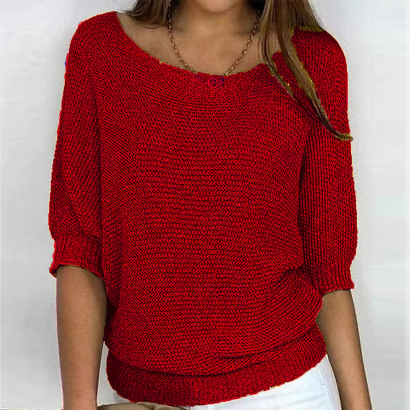 Women's relaxed plain knit sweater with round neckline and three-quarter sleeves