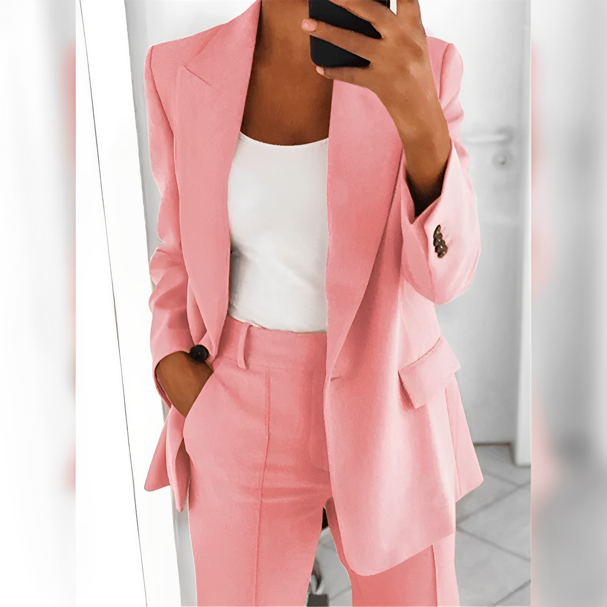 Women's tailored trouser suit set with notched-lapel blazer and matching trousers