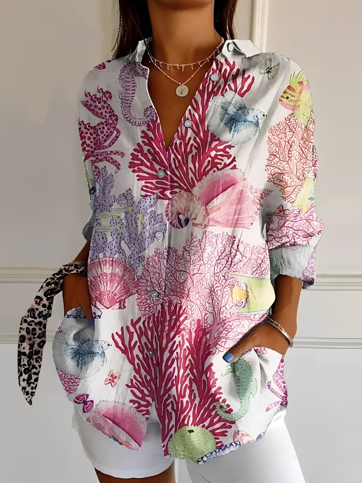 Women's long-sleeved printed button front shirt with collared neckline