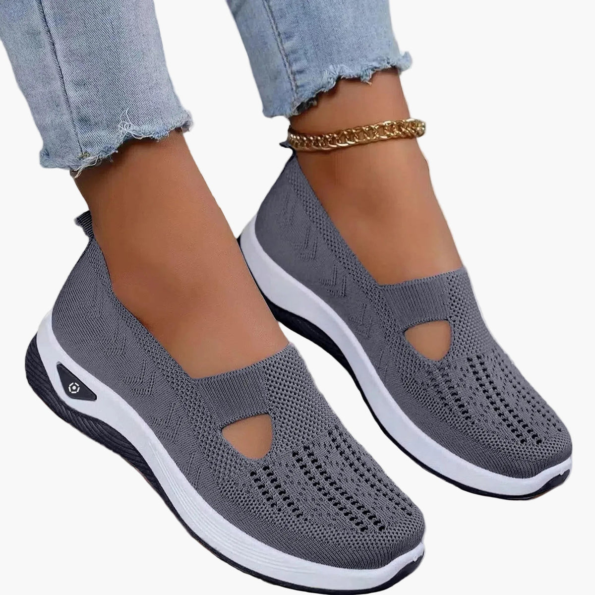 Women's slip-on trainers with textured upper, cut-out detail and white sole