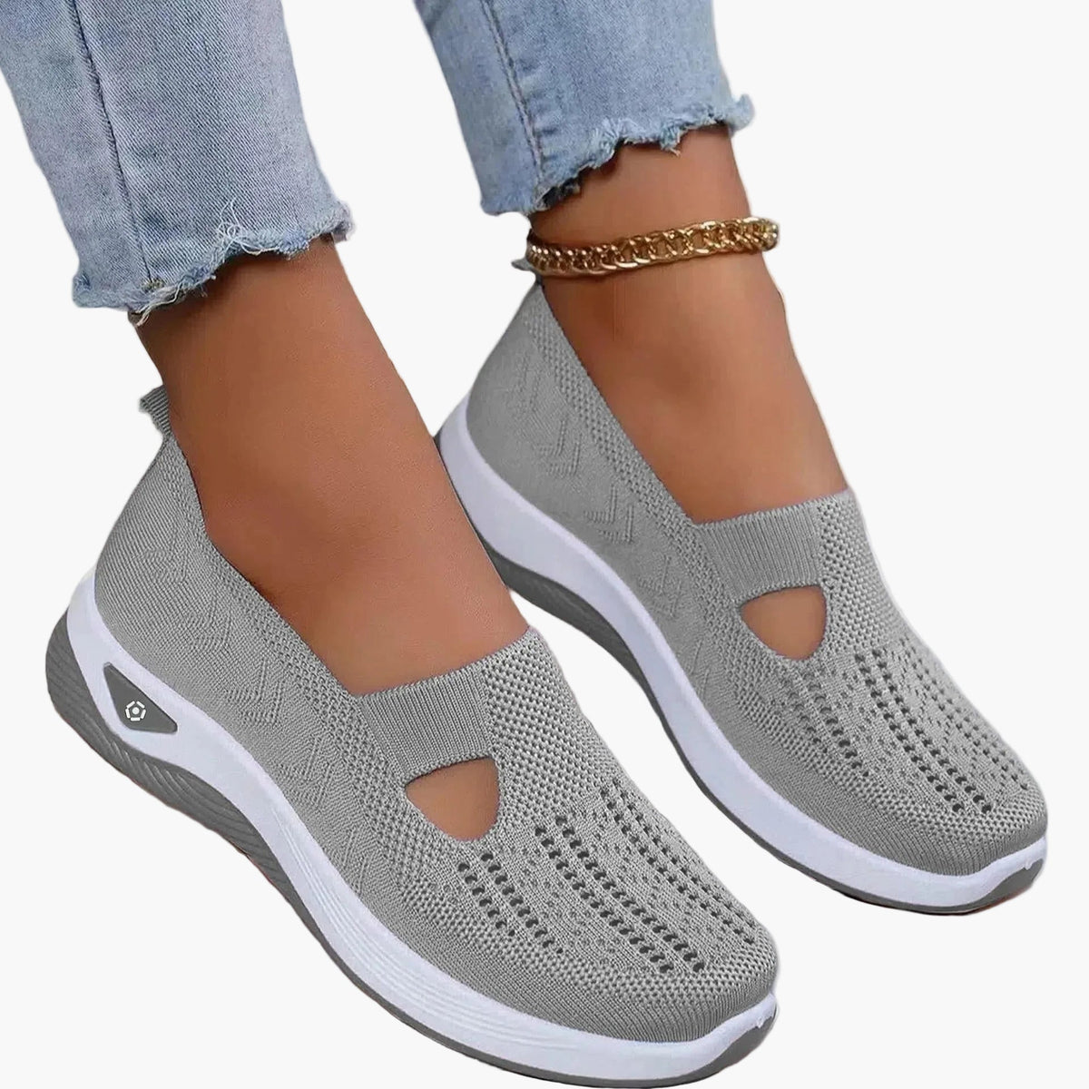 Women's slip-on trainers with textured upper, cut-out detail and white sole