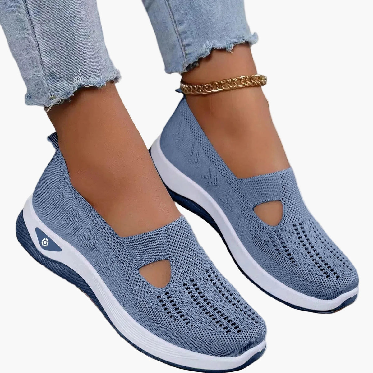Women's slip-on trainers with textured upper, cut-out detail and white sole