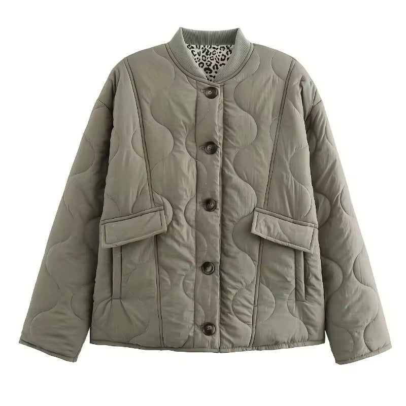 Women's quilted jacket with leopard print cuffs, button front and flap pockets