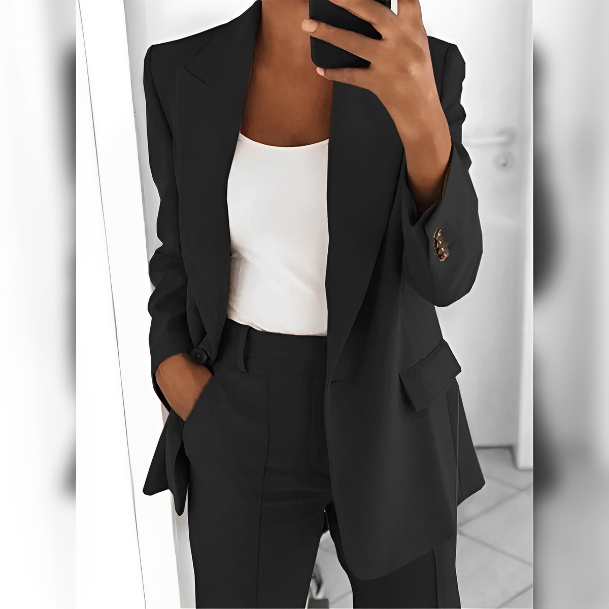 Women's tailored trouser suit set with notched-lapel blazer and matching trousers