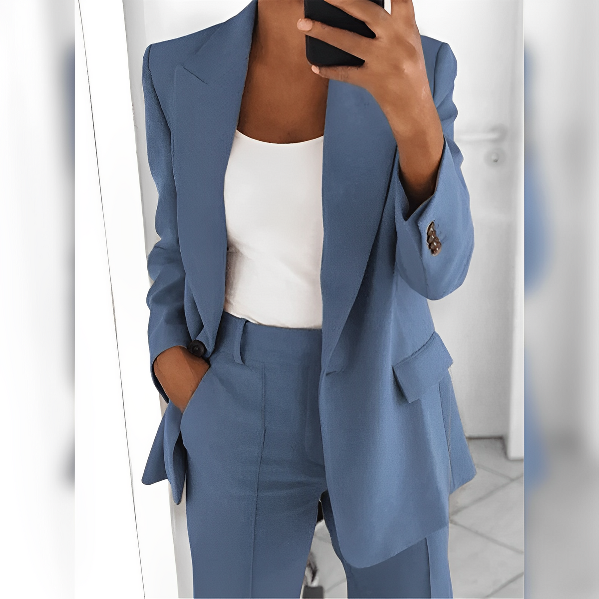Women's tailored trouser suit set with notched-lapel blazer and matching trousers