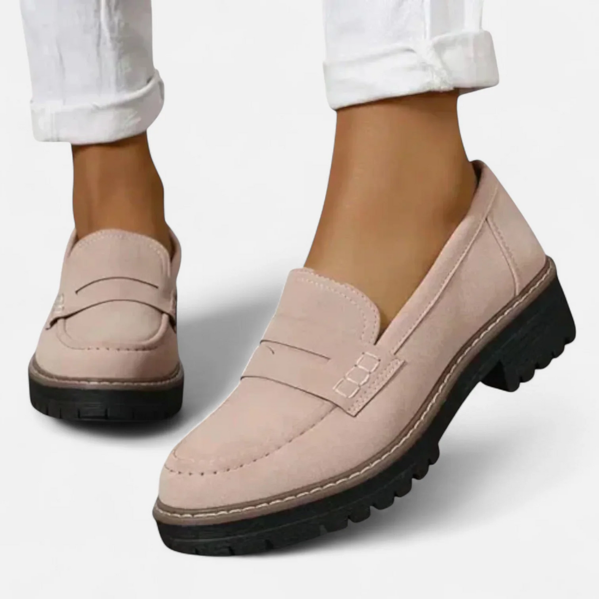 Women's penny loafers with rounded toes and chunky lug soles