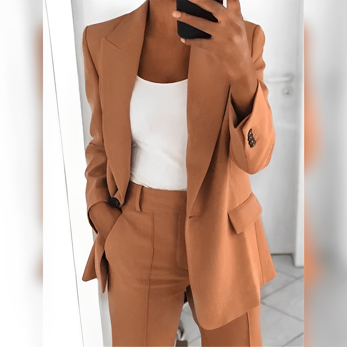 Women's tailored trouser suit set with notched-lapel blazer and matching trousers