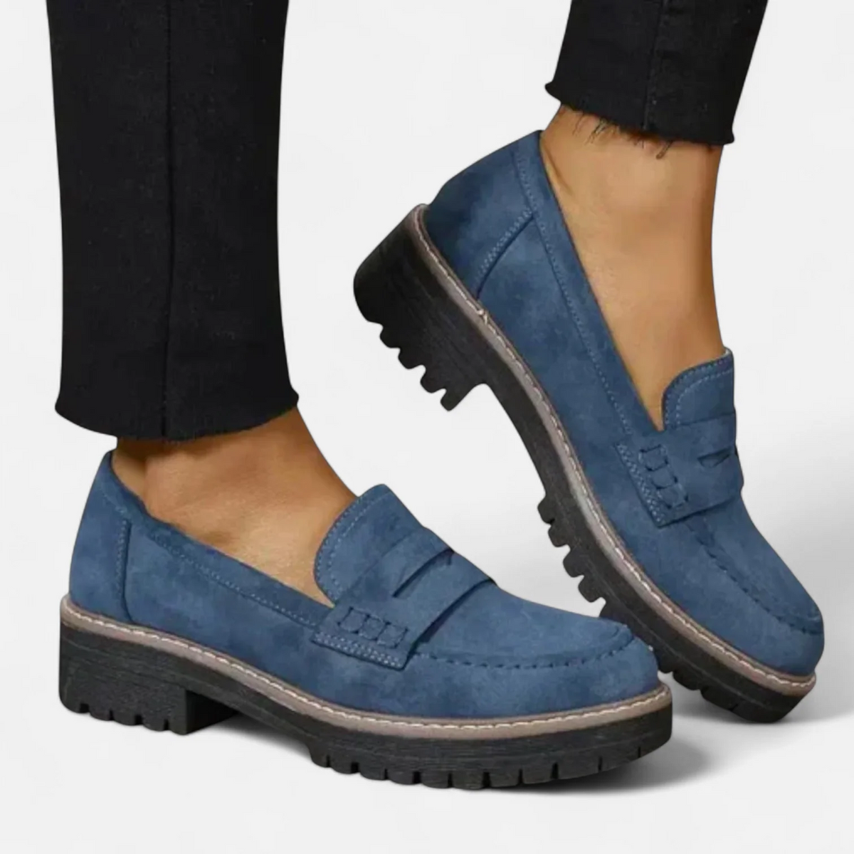 Women's penny loafers with rounded toes and chunky lug soles