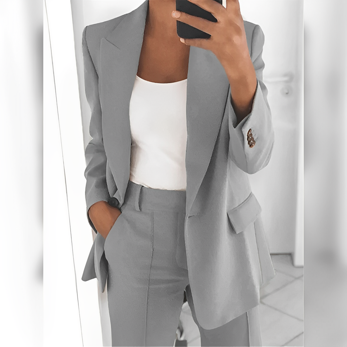 Women's tailored trouser suit set with notched-lapel blazer and matching trousers
