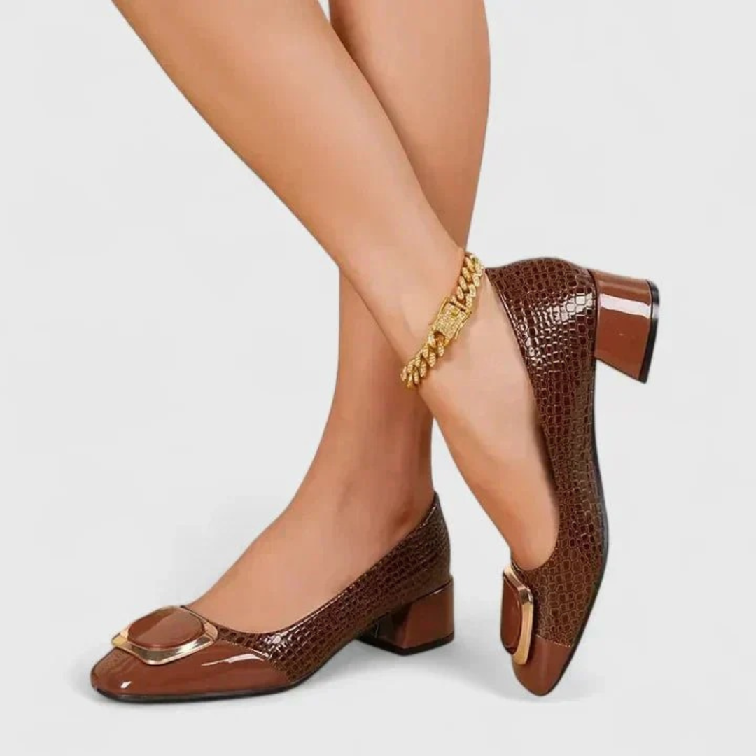 Women's textured loafers with rounded toes and mid block heels