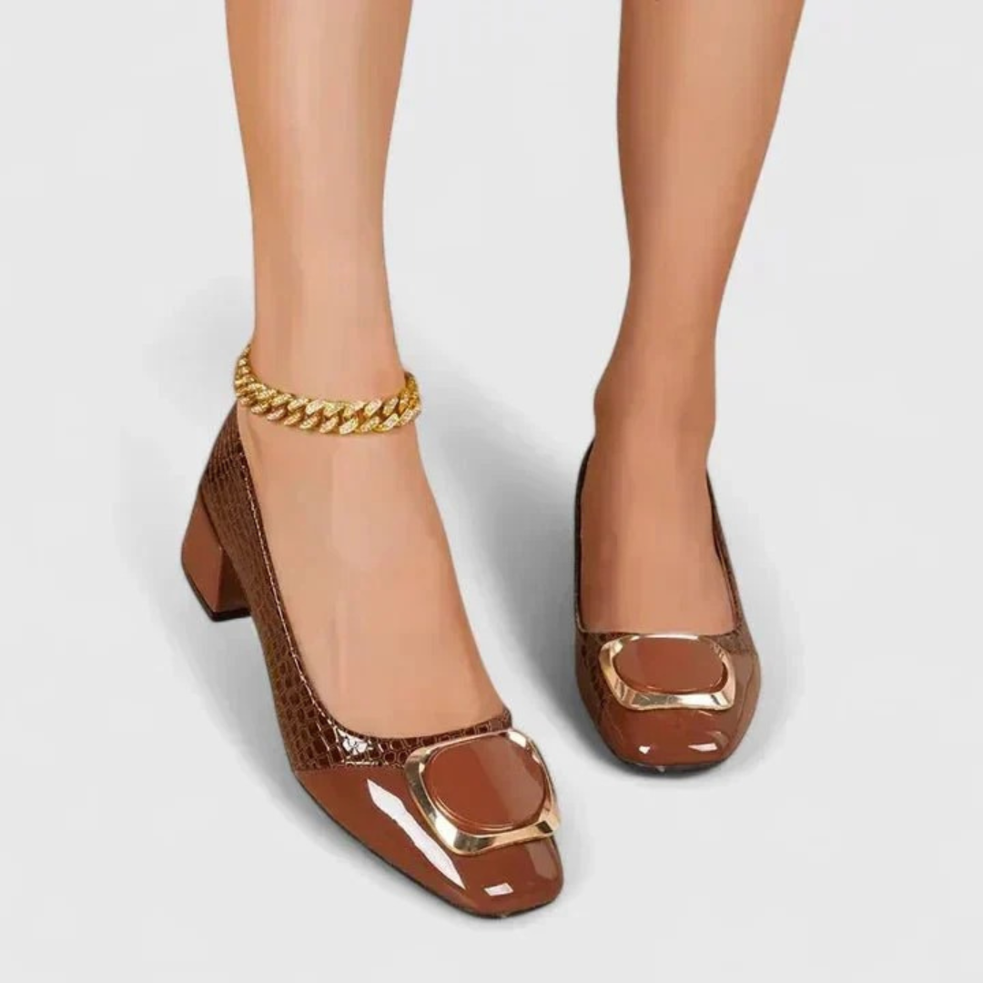 Women's textured loafers with rounded toes and mid block heels
