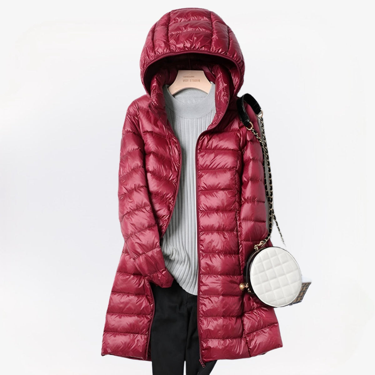 Women's quilted longline hooded puffer coat with zip front