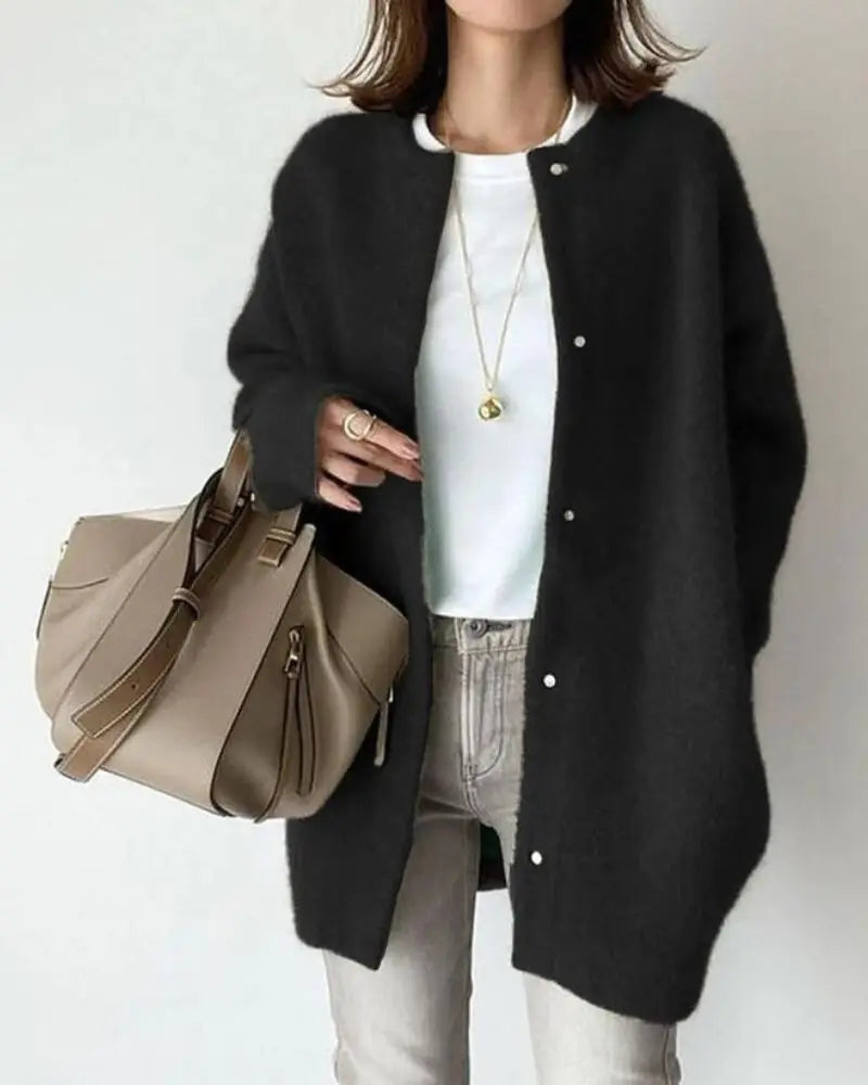 Women's longline button-front cardigan with round neckline and long sleeves