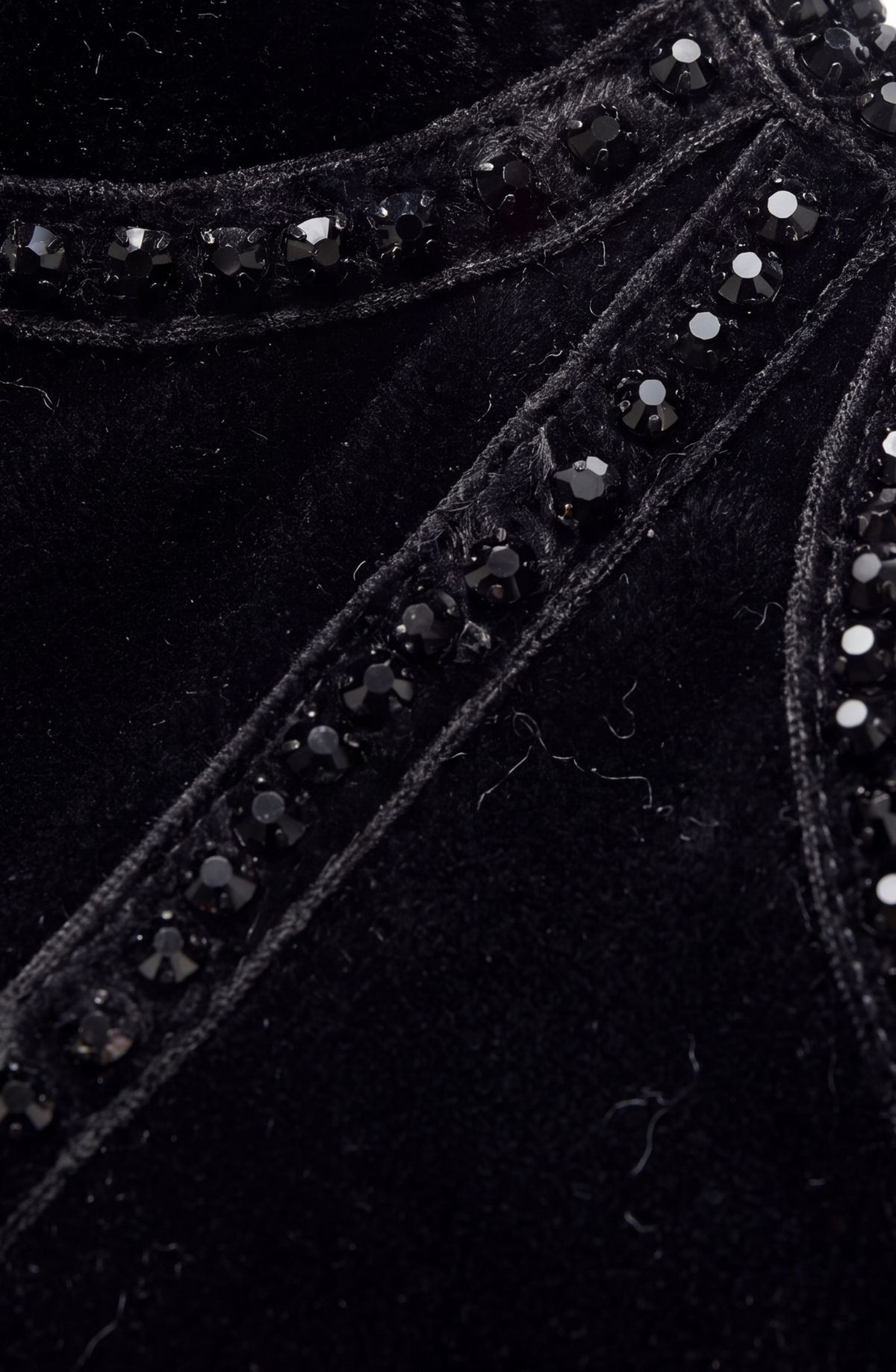 Black short-sleeve T-shirt with structured corset-style front and sparkling trim