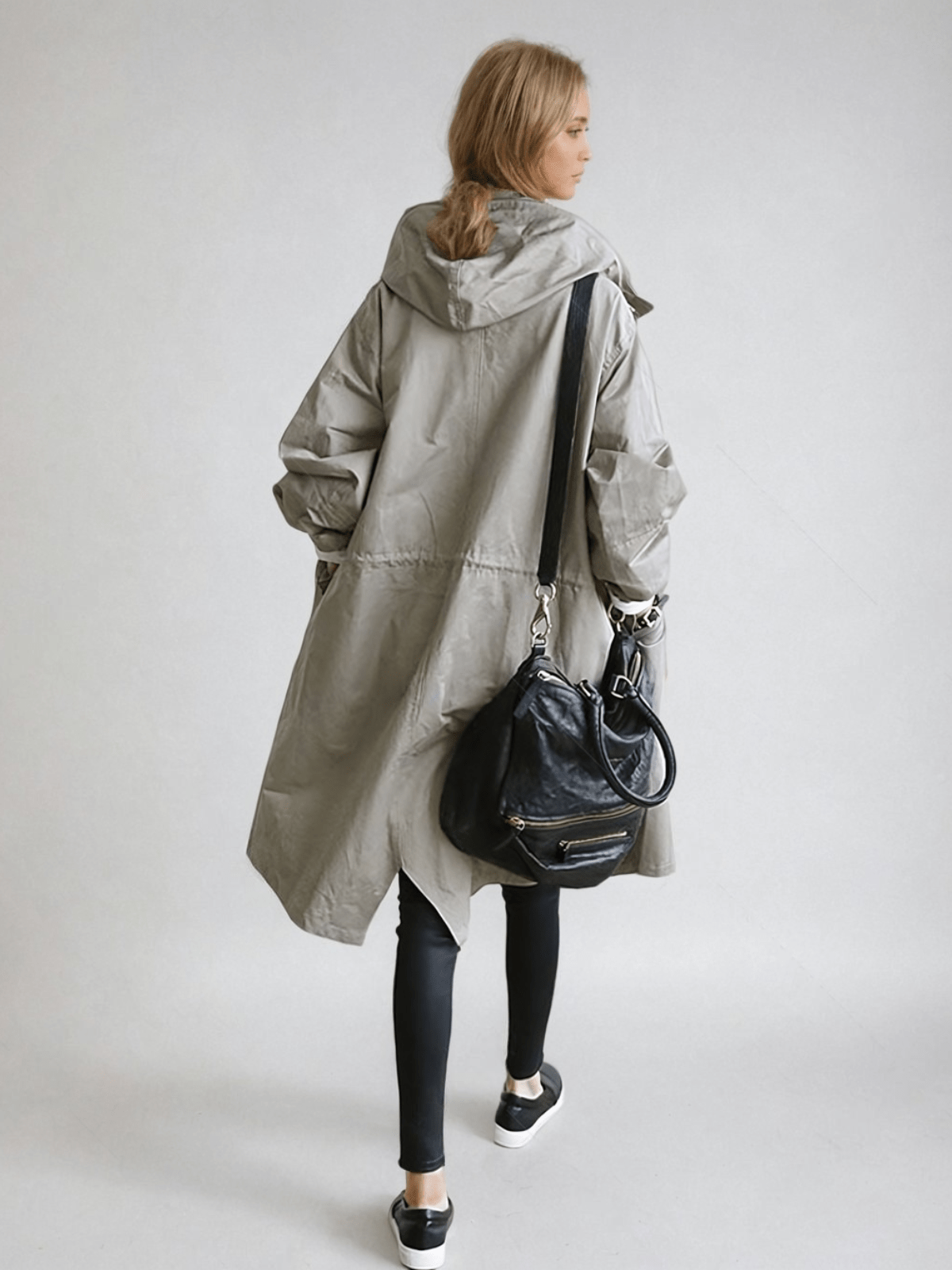 Women's longline hooded trench coat with button front and elasticated cuffs