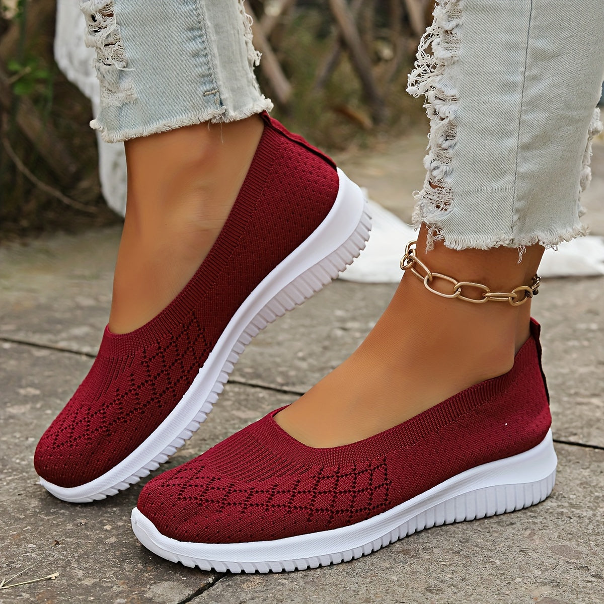Women's geometric knit slip-on shoes with closed round toes and white ridged soles