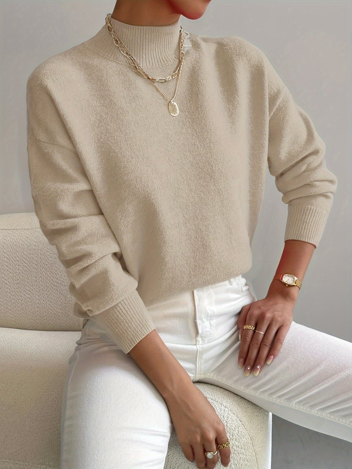 Women's long-sleeve mock neck sweater with ribbed trims