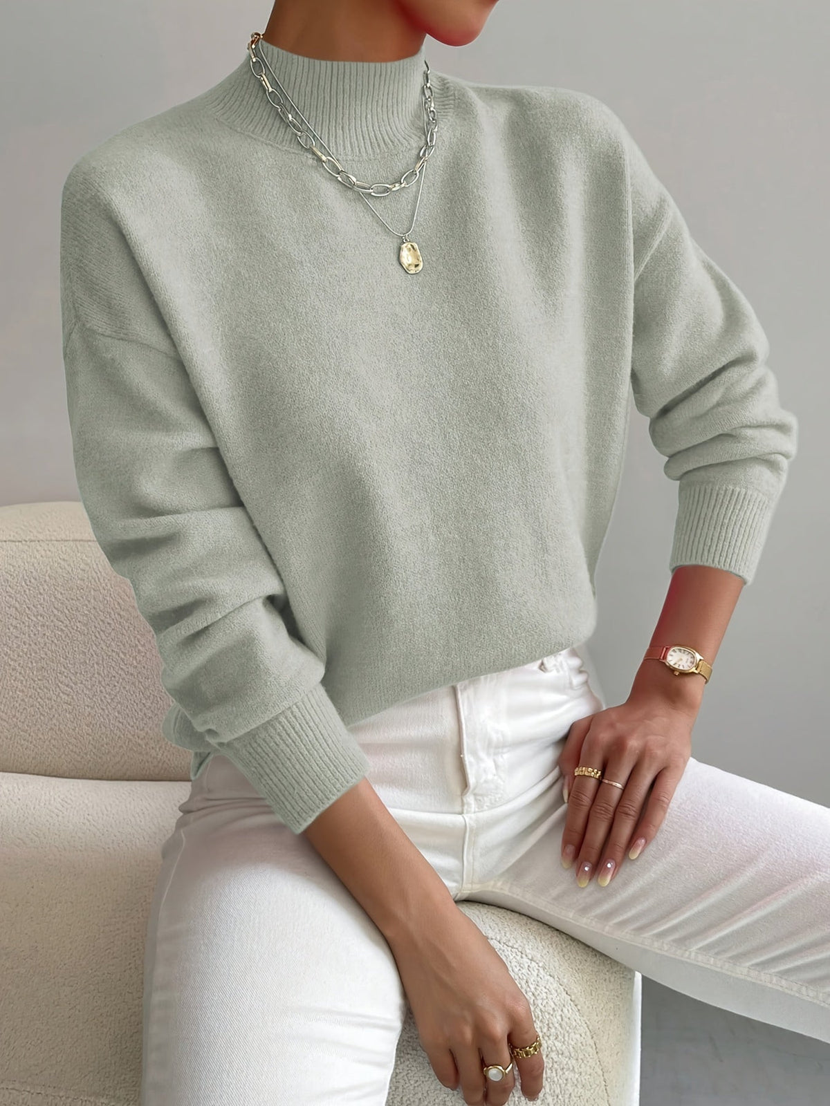 Women's long-sleeve mock neck sweater with ribbed trims