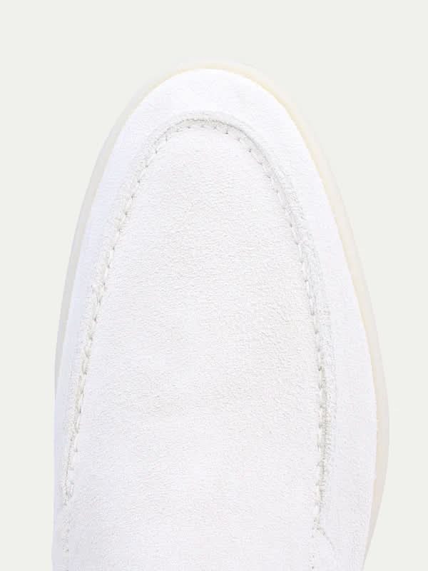 Men's white classic slip-on loafers with rounded toes and flat soles
