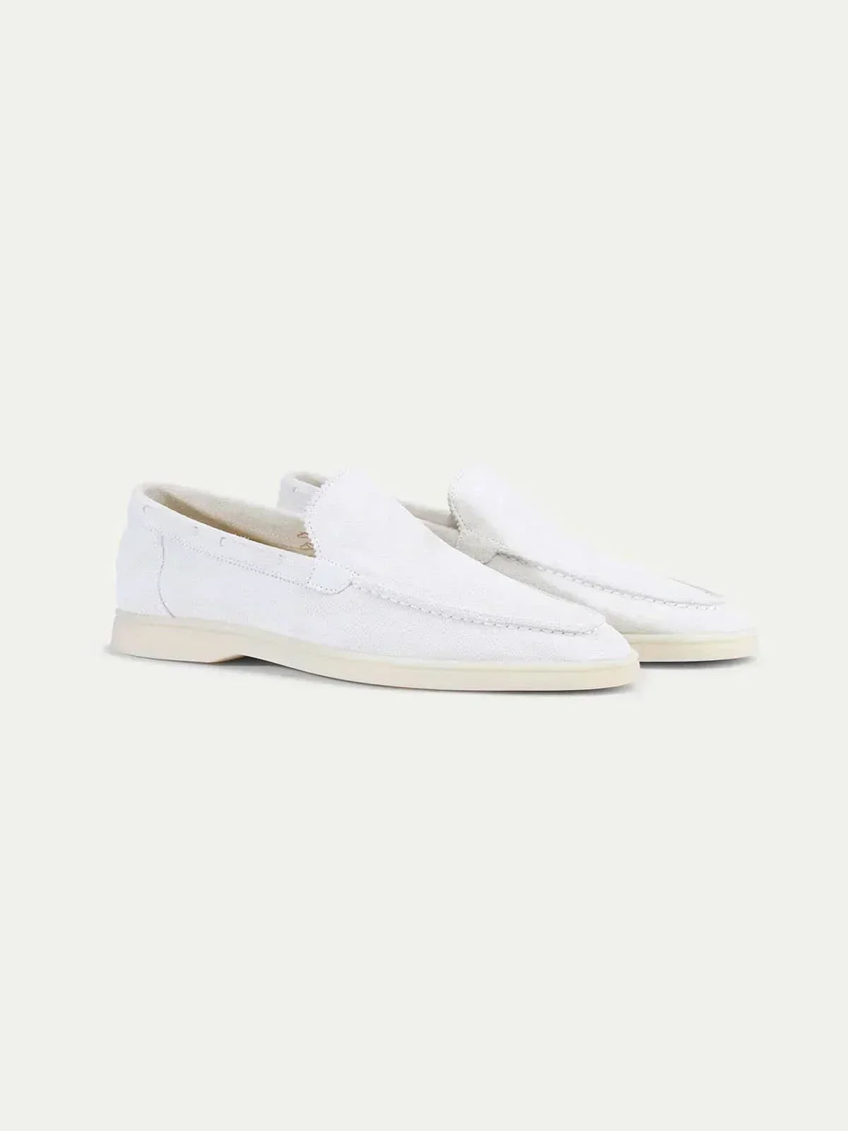 Men's white classic slip-on loafers with rounded toes and flat soles