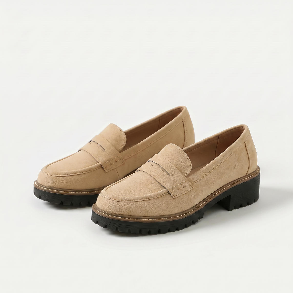Women's platform loafers with penny straps and chunky lug soles