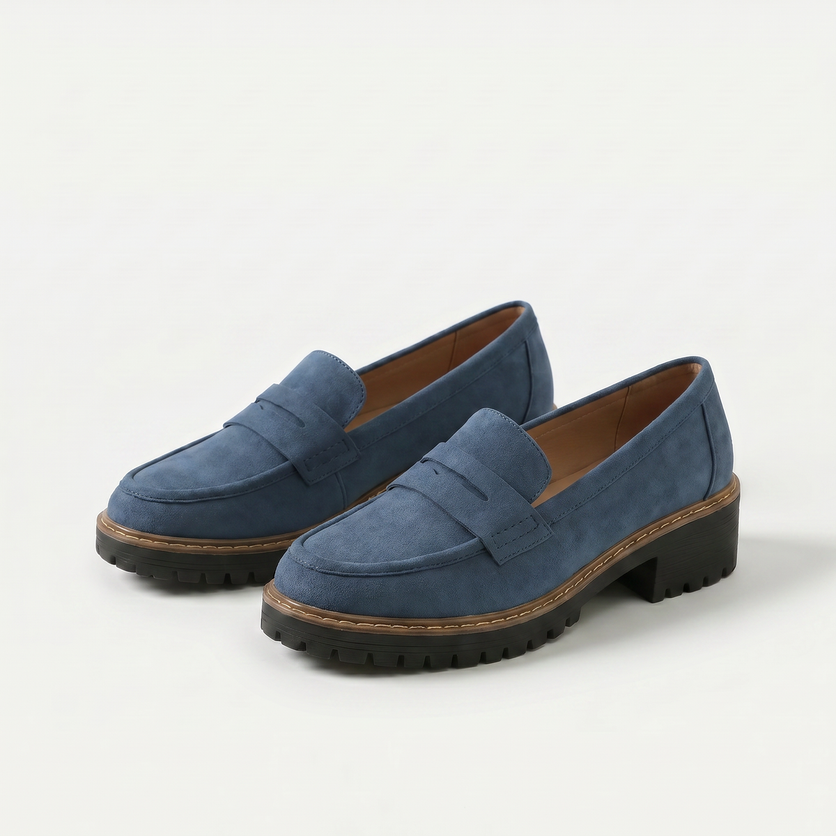 Women's platform loafers with penny straps and chunky lug soles