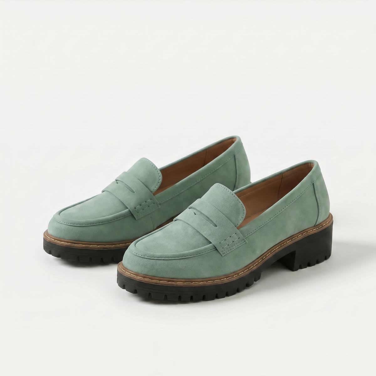 Women's platform loafers with penny straps and chunky lug soles