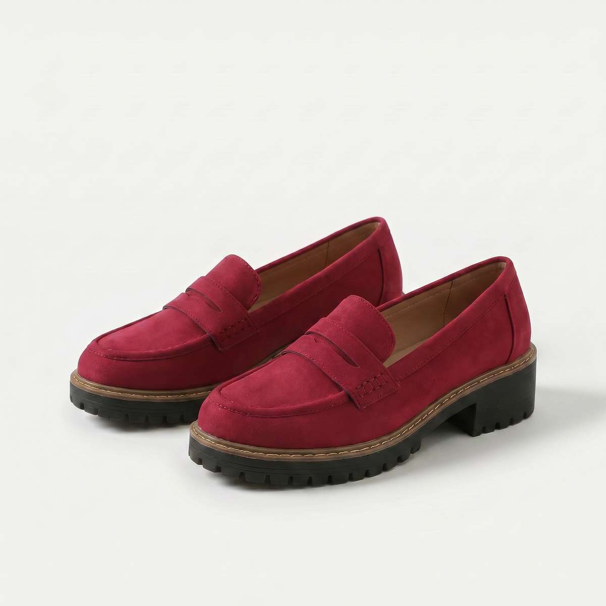 Women's platform loafers with penny straps and chunky lug soles