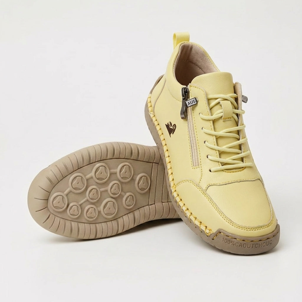 Unisex lace-up trainers with side zip and flat textured sole